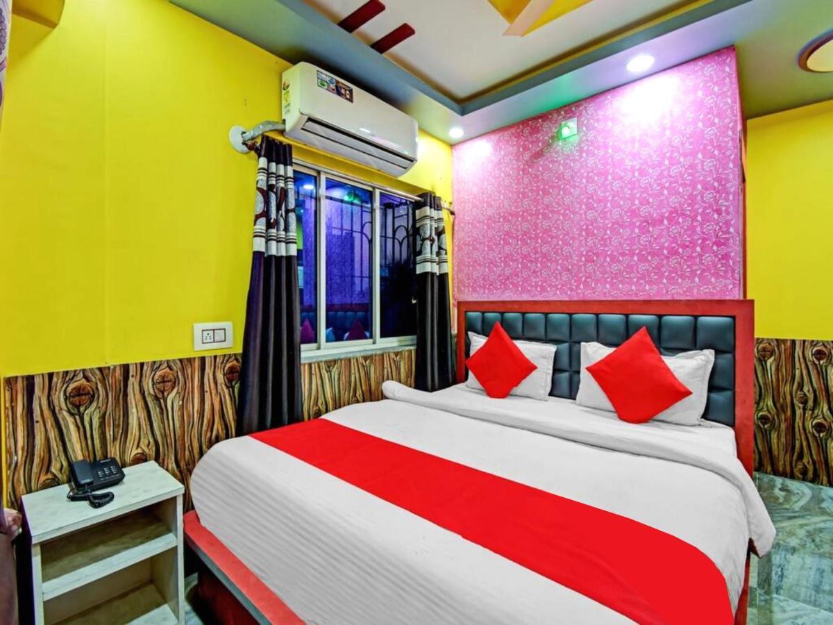 Goroomgo Happy Hotel